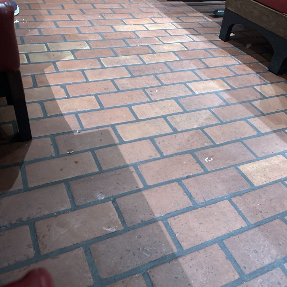 More trash in food area for guests.