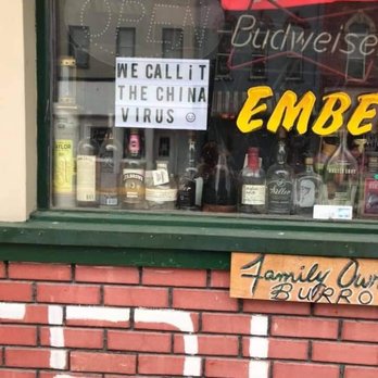 Flaming Embers - a sign in the window of a liquor shop - Dive Bars Near Me - Muscatine, Iowa Flaming Embers - a sign in the window of a liquor shop - Dive Bars Near Me - Muscatine, Iowa