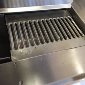 Carl's Jr - Picture of dead ants on the soda dispenser area. Live ants were walking all over the area too. - Fast Food Near Me - Clovis, California