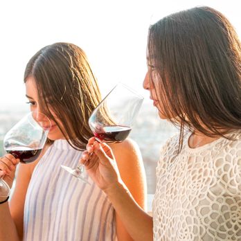 Sea Saffron - Clients enjoying wines at sunset - Food Tours Near Me Sea Saffron - Clients enjoying wines at sunset - Food Tours Near Me