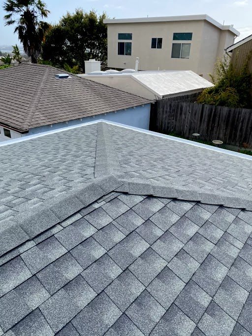 Slide of Mel's Roofing