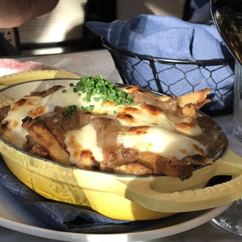 Ben Paris - Poutine: Beechers curds and short rib gravy over fries. - New American Near Me - Seattle, Washington