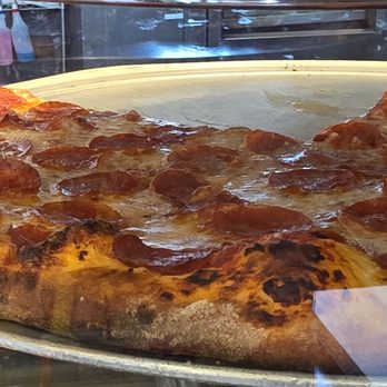 Uncle Gino’s Pizzeria - Fresh pepperoni ready for slice orders. - Pizza Near Me - Temecula, California Uncle Gino’s Pizzeria - Fresh pepperoni ready for slice orders. - Pizza Near Me - Temecula, California