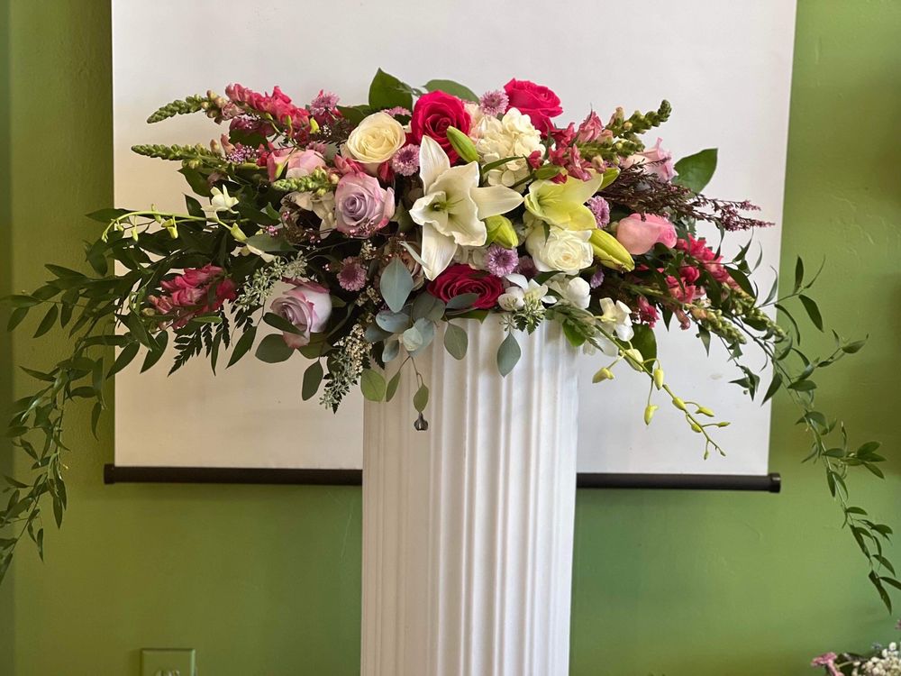 Arch flower and sweet heart table head piece (sample pic the day before) Yelp