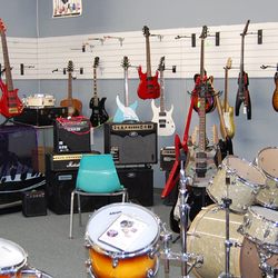 Mooresville Jewelry & Loan Pawn Shop - Mooresville musical instruments of all shapes and sizes.
