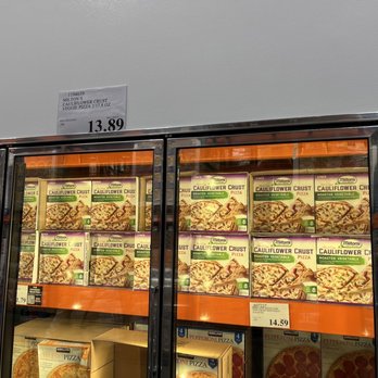 Costco - a display case of pizzas in a grocery store - Wholesale Stores Near Me - Bellingham, Washington
