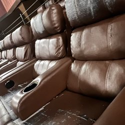 Cinemark - Chairs are nasty and need replaced. This place use to be nice but now makes my skin crawl.