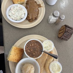 Clara's Place - Country fried steak with coleslaw and cornbread, fried catfish with mashed potatoes and black eyed peas