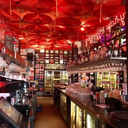 happyhappyjoyjoy East - Red umbrella ceiling of the bar-pretty awesome.