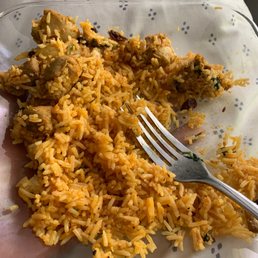 a plate of rice and meat a plate of rice and meat