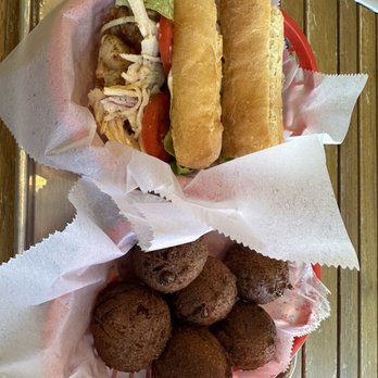 Terrebonne Po'boys - Our meal- grilled shrimp Po boy and a large basket of hushpuppies - Cajun/Creole Near Me - Lawrence, Kansas