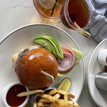 The Gage - The Regular Burger as it is labeled on the menu, a Manhattan and a Bali Ha'i Lowball. - New American Near Me - Chicago, Illinois The Gage - The Regular Burger as it is labeled on the menu, a Manhattan and a Bali Ha'i Lowball. - New American Near Me - Chicago, Illinois