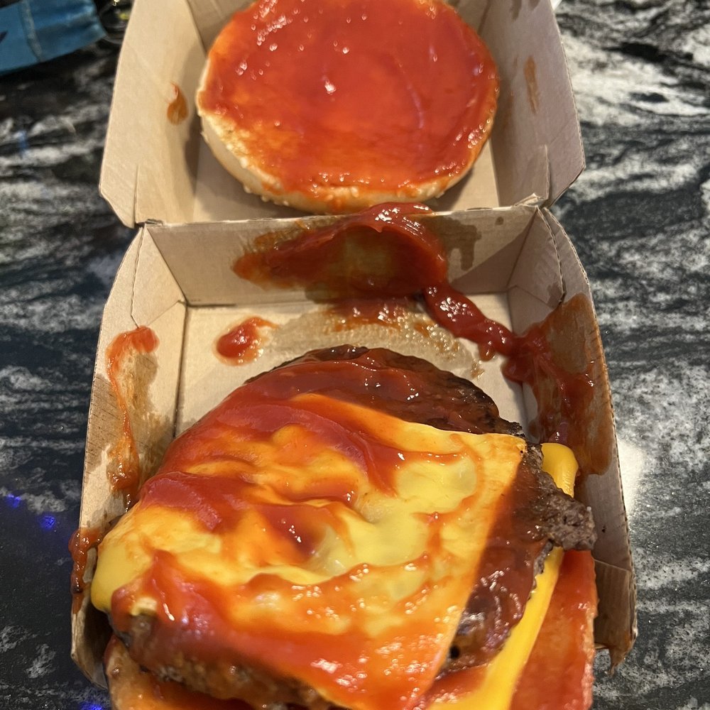 McDonald's - a cheeseburger and tomato sauce - Fast Food Near Me - Dunnellon, Florida McDonald's - a cheeseburger and tomato sauce - Fast Food Near Me - Dunnellon, Florida