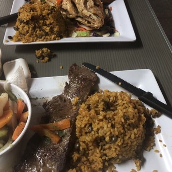 Orozco's - Skirt steak w/ arroz con gandules. Snapper in the back. - Puerto Rican Near Me - San Juan, Puerto Rico Orozco's - Skirt steak w/ arroz con gandules. Snapper in the back. - Puerto Rican Near Me - San Juan, Puerto Rico