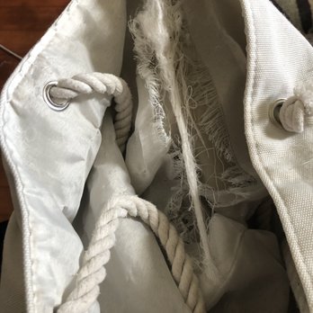 Norman's Dry Cleaners - Side 1 ripped bag - Laundry Services Near Me - Eureka, California