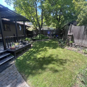LS Property Services - the back yard of a home - Lawn Services Near Me