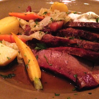 Chez Panisse - GRASS-FED BEEF BRISKET BRAISED IN ALE WITH BACON, CABBAGE, AND HORSERADISH CREAM, $29 - New American Near Me - Berkeley, California