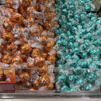 Lindt Chocolate Shop - Orange and mint truffles. - Candy Stores Near Me - Clinton, Connecticut