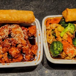 Lucky Wok - Sesame chicken & chicken broccoli combination meals with pork fried rice, egg rolls and teriyaki sticks