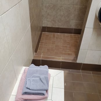 Pilot Travel Center - a bathroom with a shower and towels - Rest Stops Near Me - Murdo, South Dakota Pilot Travel Center - a bathroom with a shower and towels - Rest Stops Near Me - Murdo, South Dakota