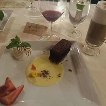 The Hobbit - Chocolate cake with pecan crust and grand marnier crème anglaise - French Near Me - Orange, California The Hobbit - Chocolate cake with pecan crust and grand marnier crème anglaise - French Near Me - Orange, California