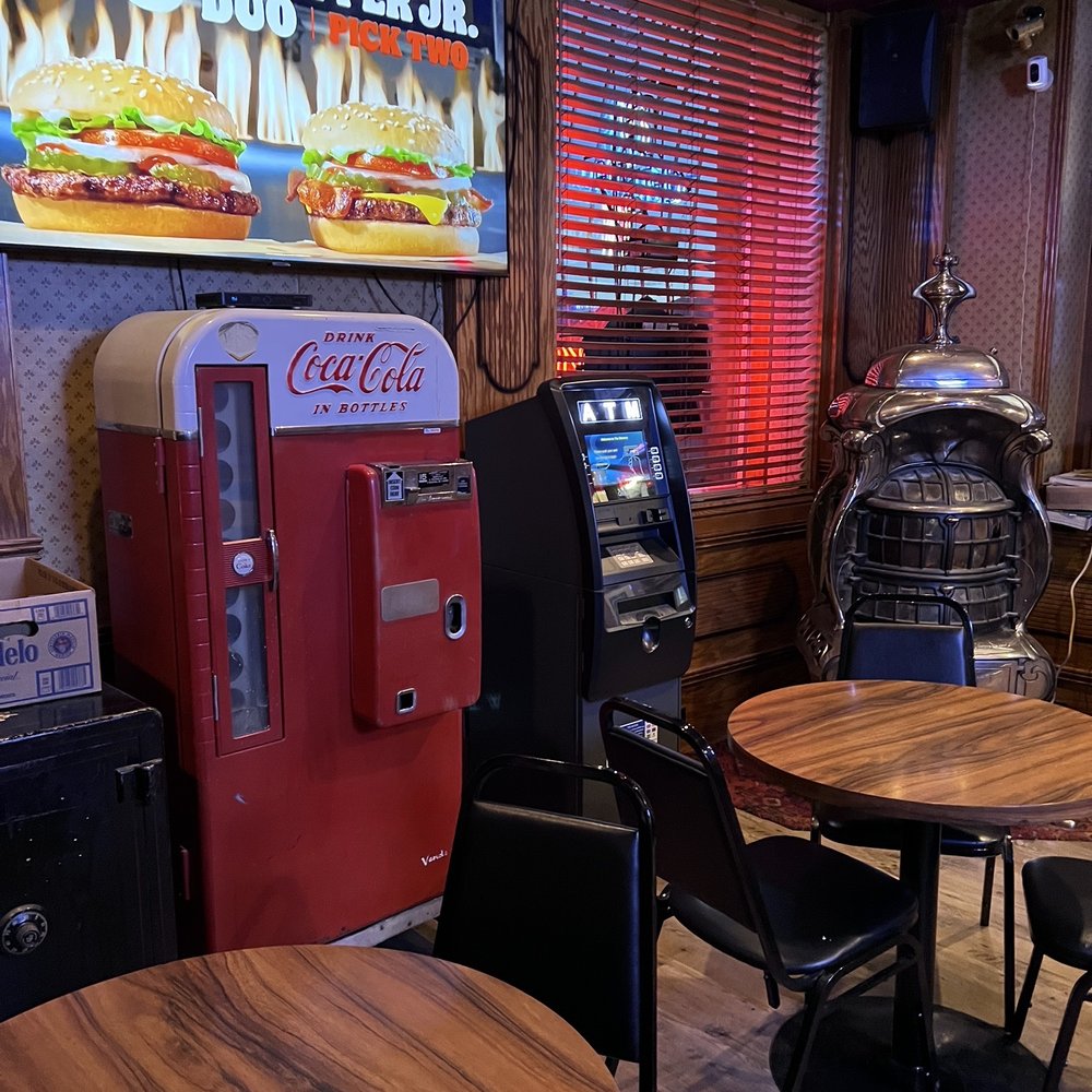 Brewery - a soda machine and a table with chairs - Nightlife Near Me - Green River, Wyoming Brewery - a soda machine and a table with chairs - Nightlife Near Me - Green River, Wyoming