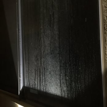 NBK Realty Management - Neighbors window, from water pipe break underneath complex. - Property Management Near Me - Los Angeles, California