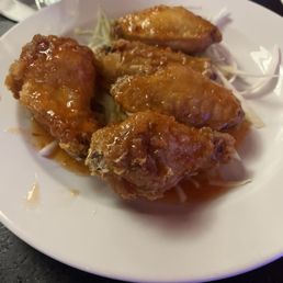 Fried chicken wings with chili sauce. Fried chicken wings with chili sauce.