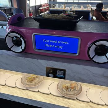 Hungry Station - Shrimp Tempura arriving on rotating bar! - Mongolian Near Me - Mcdonough, Georgia