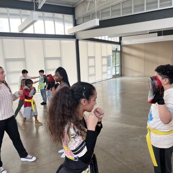Just Kickin’ It kickboxing - Newly Promoted Yellow Belts going over punch drills - Kickboxing Near Me - Chula Vista, California Just Kickin’ It kickboxing - Newly Promoted Yellow Belts going over punch drills - Kickboxing Near Me - Chula Vista, California