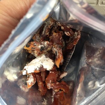 Alaska Wild Berry Products - a hand holding a bag of dried fruit - Chocolatiers & Shops Near Me - Anchorage, Alaska Alaska Wild Berry Products - a hand holding a bag of dried fruit - Chocolatiers & Shops Near Me - Anchorage, Alaska