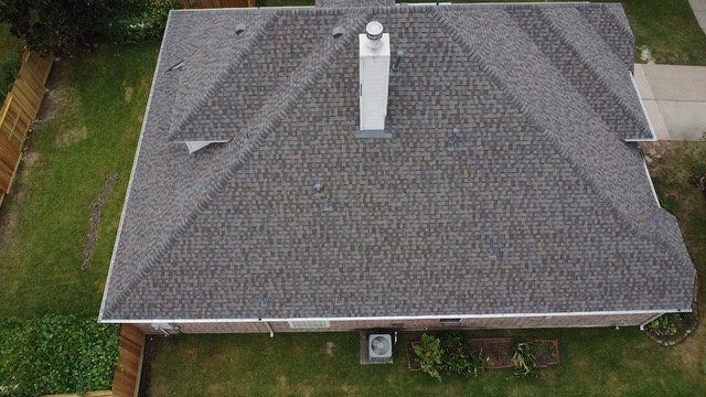 Slide of Rhodes Roofing Services