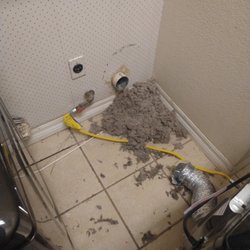Repair Service Specialist - Dryer not drying clothes in timed cycle ,this is why the vent was clogged all the way up.
