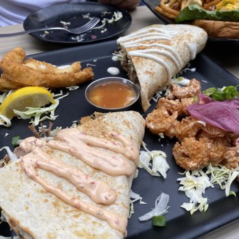 Down the Hatch Maui - Appetizer Sample Platter. The calamari is SO tender and the quesadillas were THICC(K). Lava lava shrimp with pickled onion also yummy. - Seafood Near Me - Lahaina, Hawaii Down the Hatch Maui - Appetizer Sample Platter. The calamari is SO tender and the quesadillas were THICC(K). Lava lava shrimp with pickled onion also yummy. - Seafood Near Me - Lahaina, Hawaii
