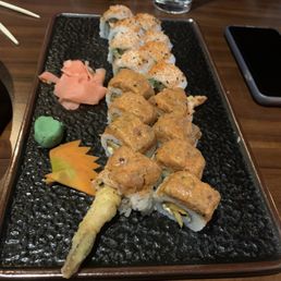 Two rolls: Top Spicy Tuna and below was volcano roll