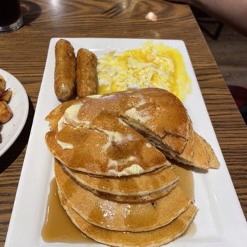 Mimi's Cafe - Combo plate of pancakes, thin, nice and light with sausage and eggs over easy. - Breakfast & Brunch Near Me - Corona, California Mimi's Cafe - Combo plate of pancakes, thin, nice and light with sausage and eggs over easy. - Breakfast & Brunch Near Me - Corona, California