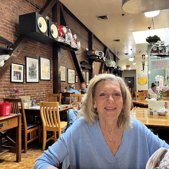 Omelette Express - Ignore the beautiful woman and check out the wall decorations - Breakfast & Brunch Near Me - Santa Rosa, California