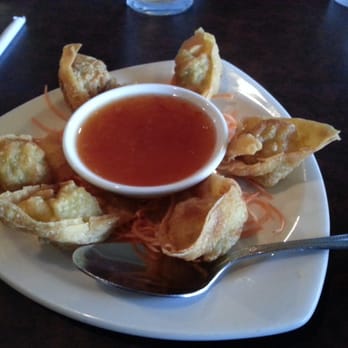 Sukhothai - A11 Fried Wonton $3.95: Deep fried wonton skin stuffed with ground chicken and shrimp, served with sweet chili sauce. - Thai Near Me - Rochester Hills, Michigan