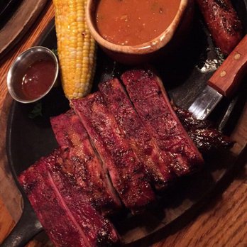 H3 Ranch - Ribs & sausage. Can you tell the superrrrr burnt ribs on the bottom? It's a little hidden. - Steakhouses Near Me - Fort Worth, Texas