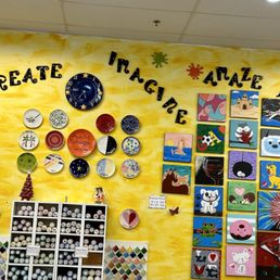 The wall of paints and some canvas painting designs.
