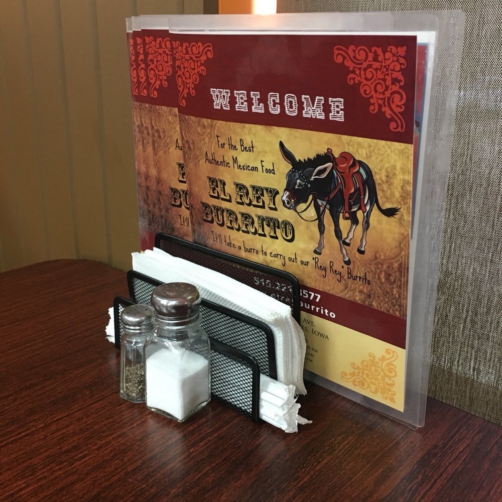 El Rey Burritos - a picture of a table with salt and pepper shakers - Mexican Near Me - West Des Moines, Iowa El Rey Burritos - a picture of a table with salt and pepper shakers - Mexican Near Me - West Des Moines, Iowa