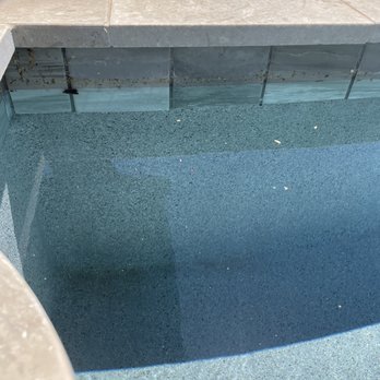 Aqua Blue Pools and Spas - Again, the build up, minutes after the technician "brushed and cleaned" our pool walls. - Pool & Hot Tub Service Near Me - Scottsdale, Arizona Aqua Blue Pools and Spas - Again, the build up, minutes after the technician "brushed and cleaned" our pool walls. - Pool & Hot Tub Service Near Me - Scottsdale, Arizona