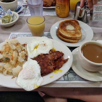 Austin House Restaurant - Brunch special - Corned beef hash with two eggs (sunny side up), home fries, toast (rye), pineapple juice, and coffee. $12.95. - Diners Near Me - Forest Hills, New York