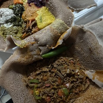 Sini Coffee Lounge - veggie combo and juicy beef Tibs - Ethiopian Near Me - Dallas, Texas Sini Coffee Lounge - veggie combo and juicy beef Tibs - Ethiopian Near Me - Dallas, Texas