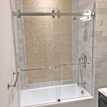 ProHouz - Frameless sliding shower door system with clean lines, perfect for compact modern bathrooms. - Glass & Mirrors Near Me - Chester Township, New Jersey ProHouz - Frameless sliding shower door system with clean lines, perfect for compact modern bathrooms. - Glass & Mirrors Near Me - Chester Township, New Jersey