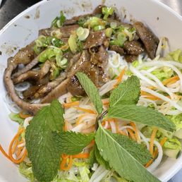 Cơm Đặc Biệt / Grilled Chicken, Pork Chops, Korean-style Ribs, and Egg Roll Cơm Đặc Biệt / Grilled Chicken, Pork Chops, Korean-style Ribs, and Egg Roll