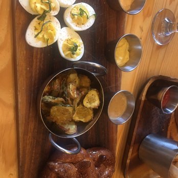 First Draft Taproom & Kitchen - Pub board with deviled eggs, pickle chips, and pretzels - Bars Near Me - Denver, Colorado
