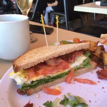 Sidewalk Cafe - That's a good looking breakfast sandwich! - Tacos Near Me - Venice, California