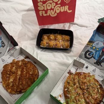 Mazala Pizza by Moti - Chicken Tikka Pizza, Butter Chicken Pizza, Moti Momos - Coffee & Tea Near Me - Chicago, Illinois