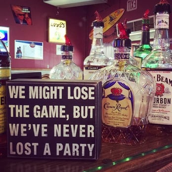 Spanky's - bottles of alcohol on a bar - American Near Me - Seneca, Kansas Spanky's - bottles of alcohol on a bar - American Near Me - Seneca, Kansas
